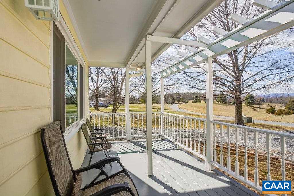 3585 Advance Mills Road Ruckersville, VA 22968 - Photo 3 of 39 a view of a chairs and table in the balcony