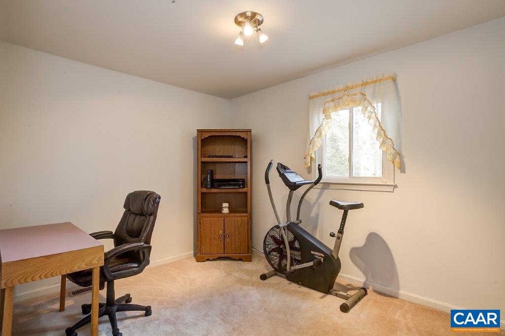 3585 Advance Mills Road Ruckersville, VA 22968 - Photo 36 of 39 a view of a workspace with furniture and a window