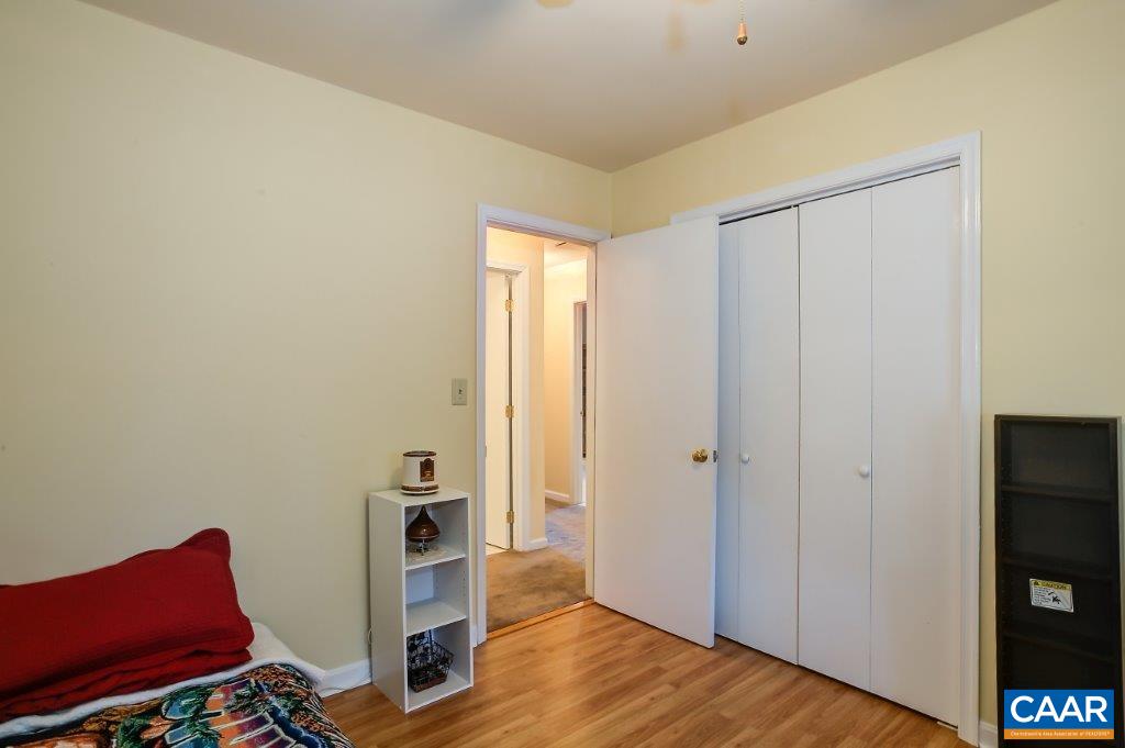3585 Advance Mills Road Ruckersville, VA 22968 - Photo 37 of 39 a view of a hallway with workspace and wooden floor
