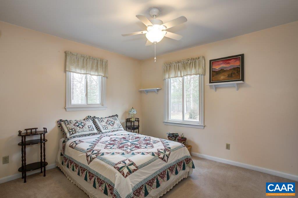 3585 Advance Mills Road Ruckersville, VA 22968 - Photo 38 of 39 a bedroom with a bed and a window