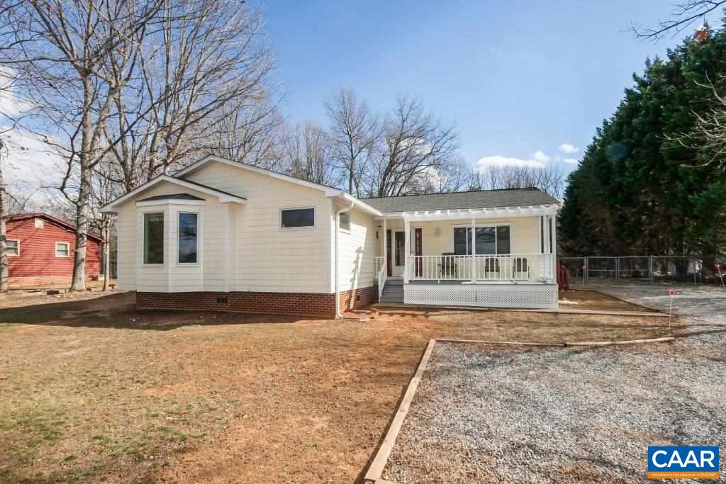 3585 Advance Mills Road Ruckersville, VA 22968 - Photo 5 of 39 a front view of a house with a yard