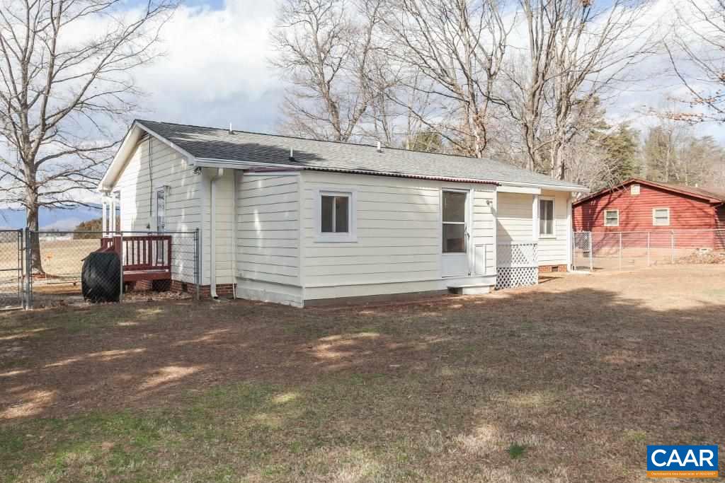 3585 Advance Mills Road Ruckersville, VA 22968 - Photo 10 of 39 a view of a house with a yard