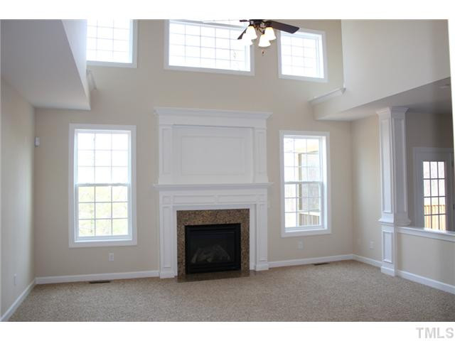 2804 Bending Tree Court Raleigh, NC 27613 - Photo 5 of 25 Granite Surround Gas Log Fireplace, Custom Mantle with Detail Trim! Den/Family/Great Room