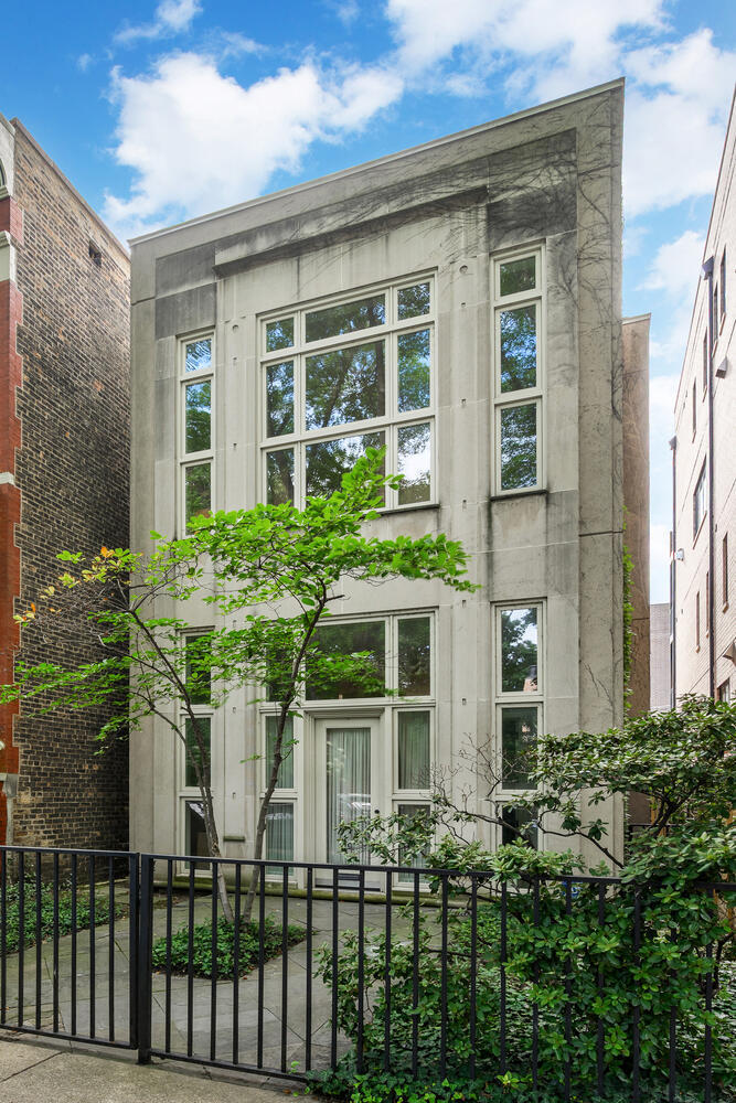 a house view with a garden space