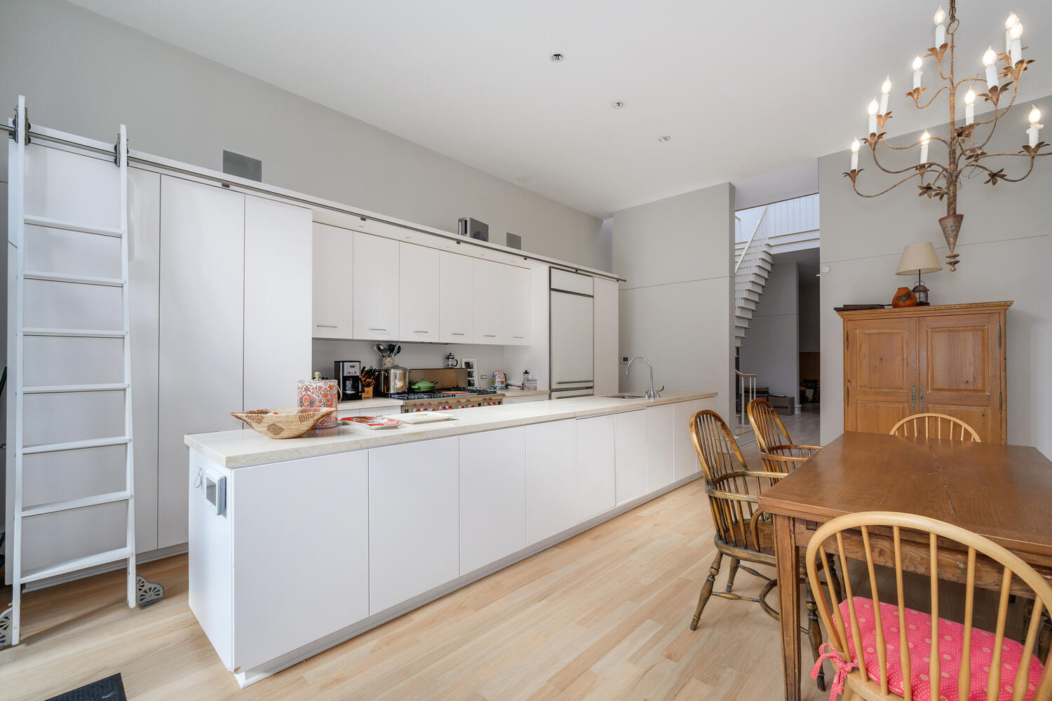 2214 North Burling Street Chicago, IL 60614 - Photo 12 of 29 a kitchen with sink cabinets and window