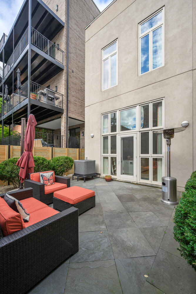 2214 North Burling Street Chicago, IL 60614 - Photo 29 of 29 a front view of a building with outdoor seating