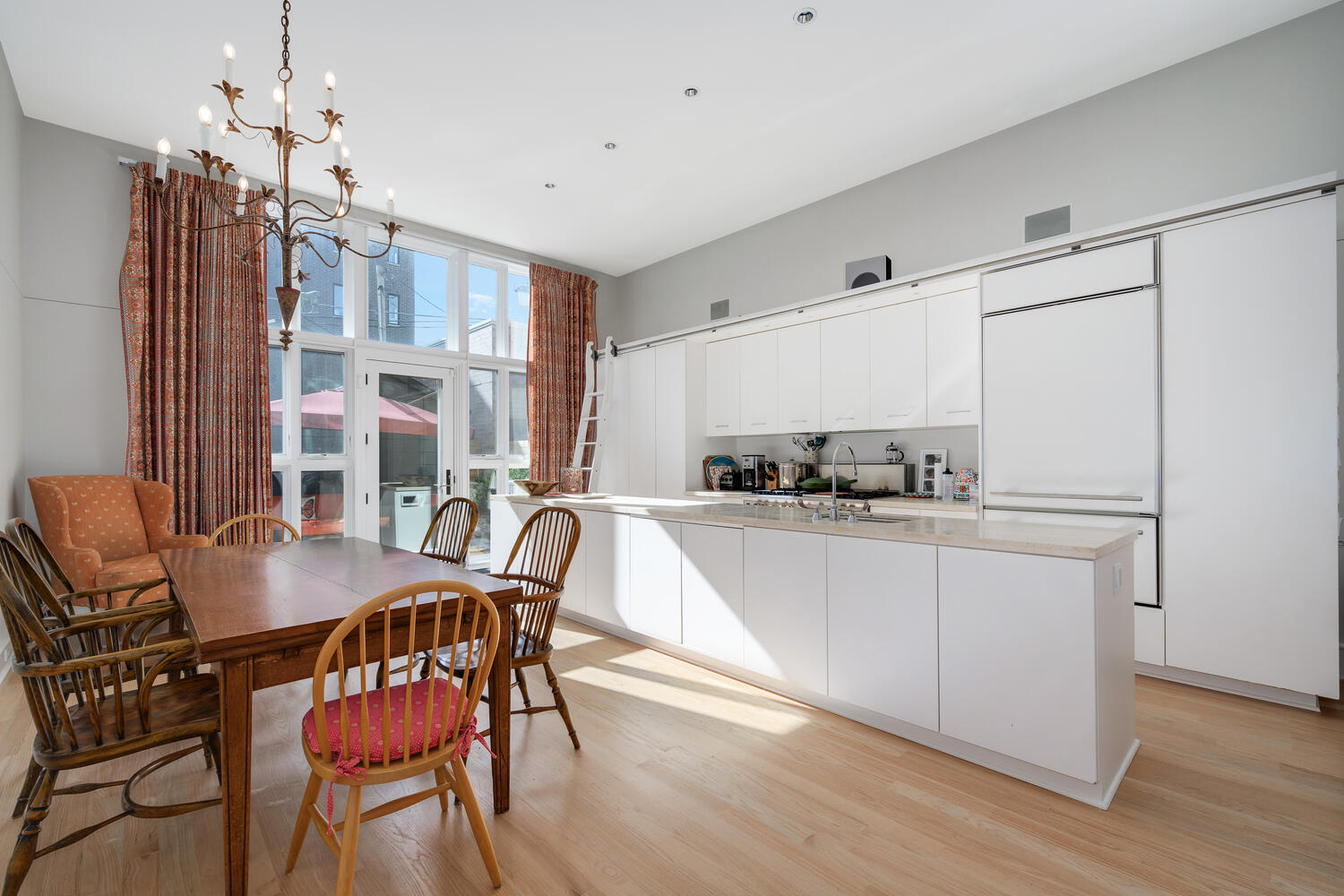 2214 North Burling Street Chicago, IL 60614 - Photo 8 of 29 a view of a dining room with furniture window and wooden floor