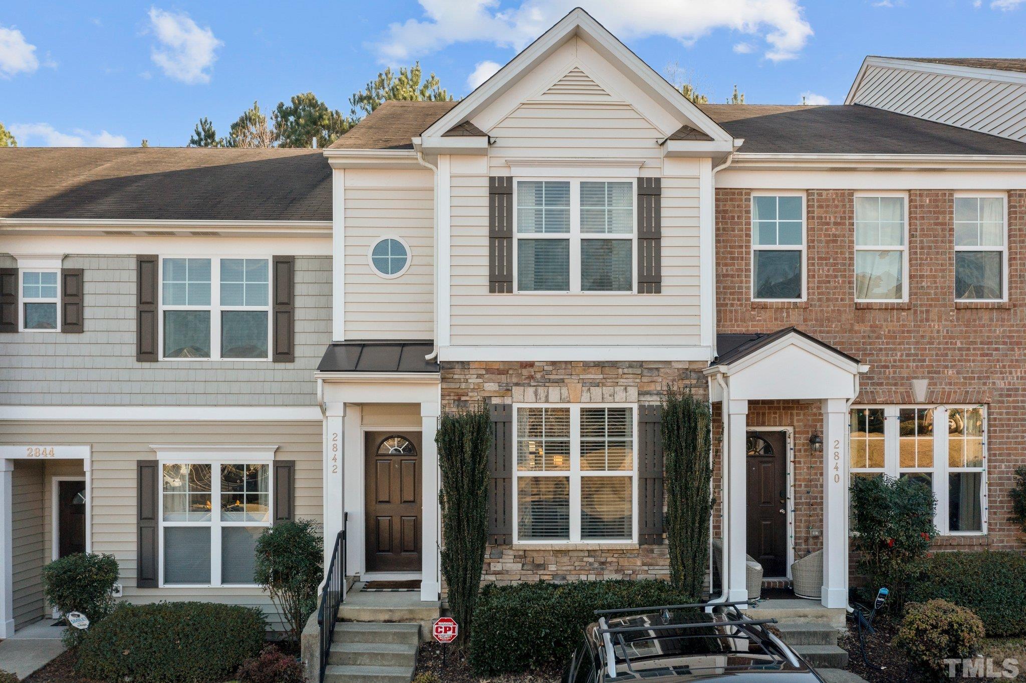 2842 Casona Way Raleigh, NC 27616 - Photo 1 of 27 a front view of a house with a yard
