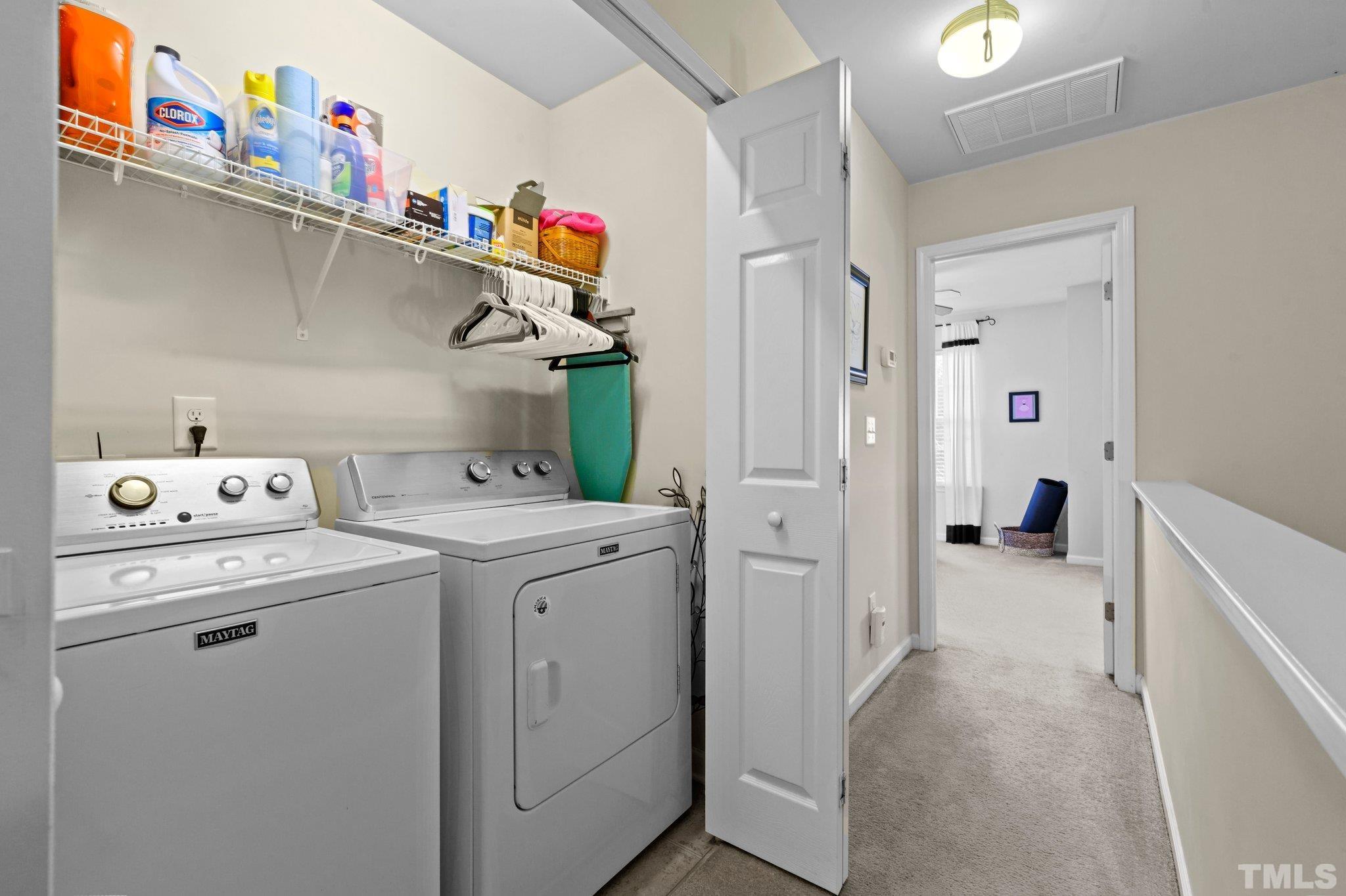 2842 Casona Way Raleigh, NC 27616 - Photo 17 of 27 a utility room with dryer and washer