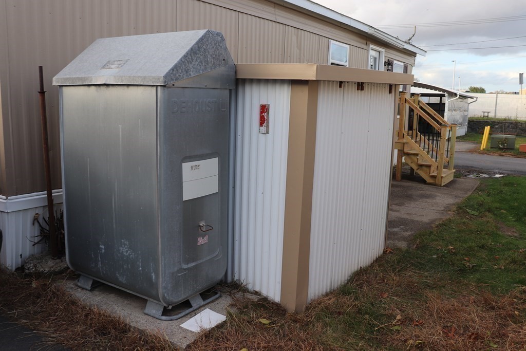 557 Southwest Cutoff, Unit 120 Worcester, MA 01607 - Photo 6 of 17 a storage room with an outdoor view