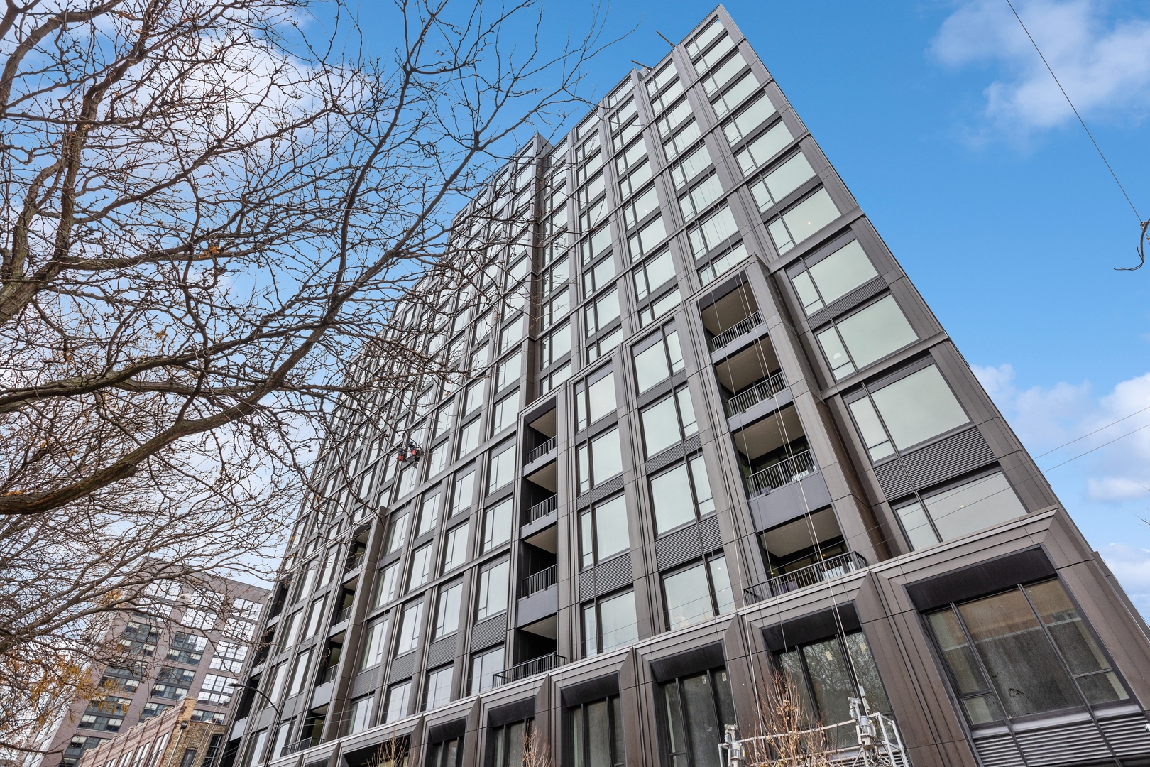 21 North May Street, Unit 301 Chicago, IL 60607 - Photo 2 of 35 front view of a building