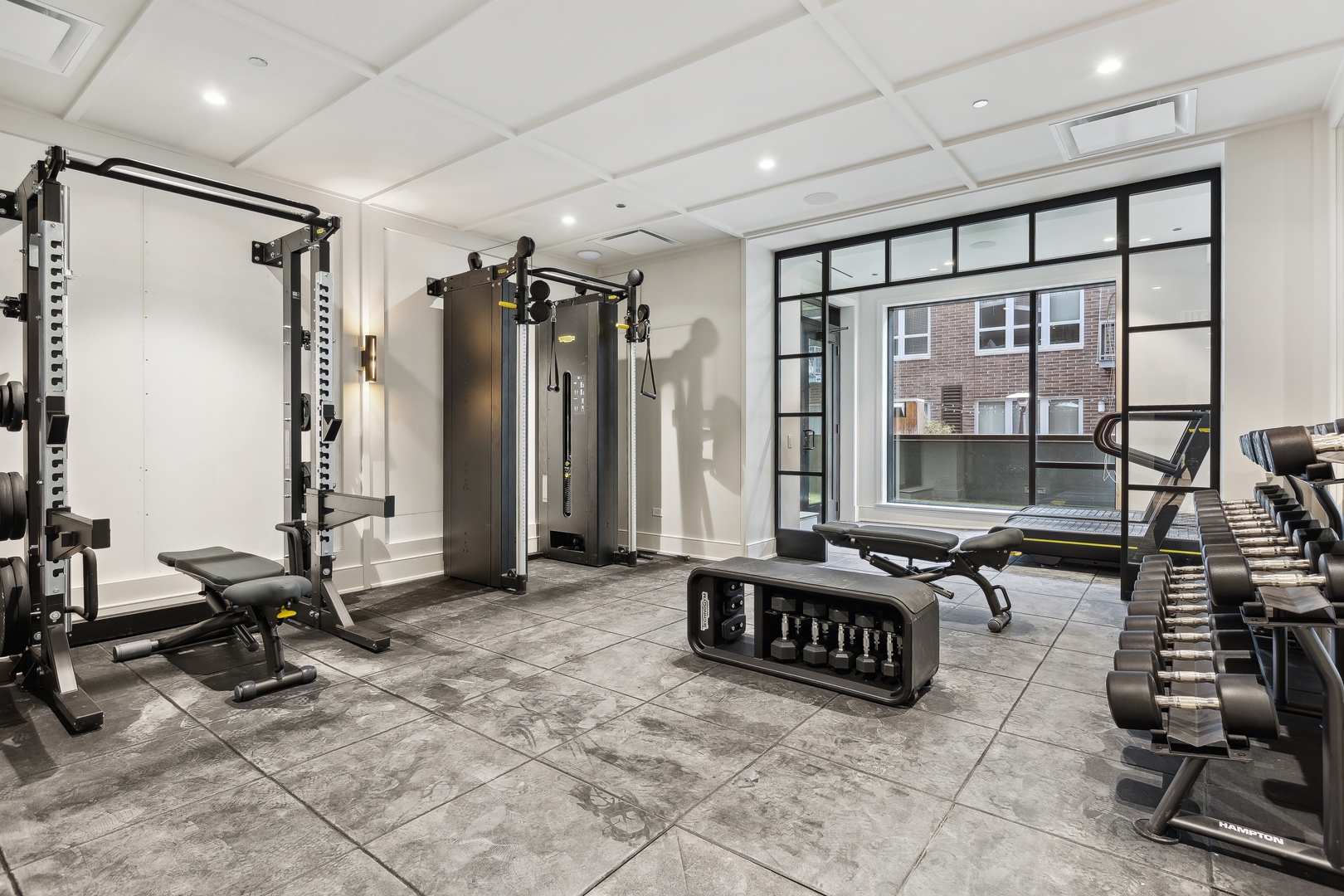 21 North May Street, Unit 301 Chicago, IL 60607 - Photo 32 of 35 a view of room with gym equipment and floor to ceiling window