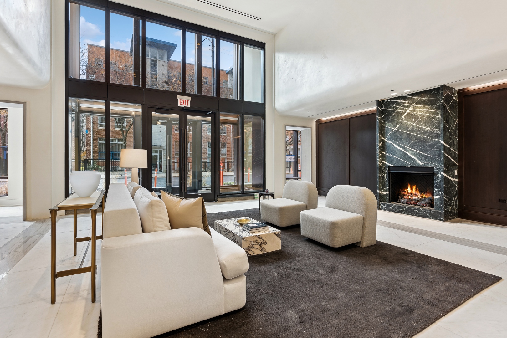 21 North May Street, Unit 301 Chicago, IL 60607 - Photo 6 of 35 a living room with furniture and a fireplace