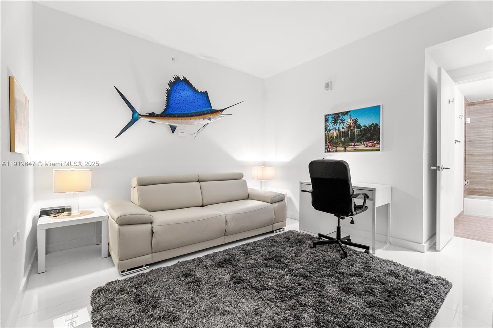 1010 Brickell Avenue, Unit 4206 Miami, FL 33131 - Photo 17 of 33 a living room with furniture and a rug