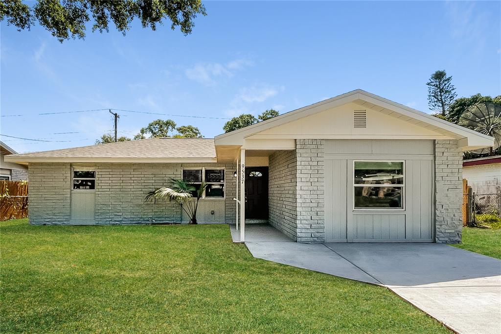 a front view of a house with a garage