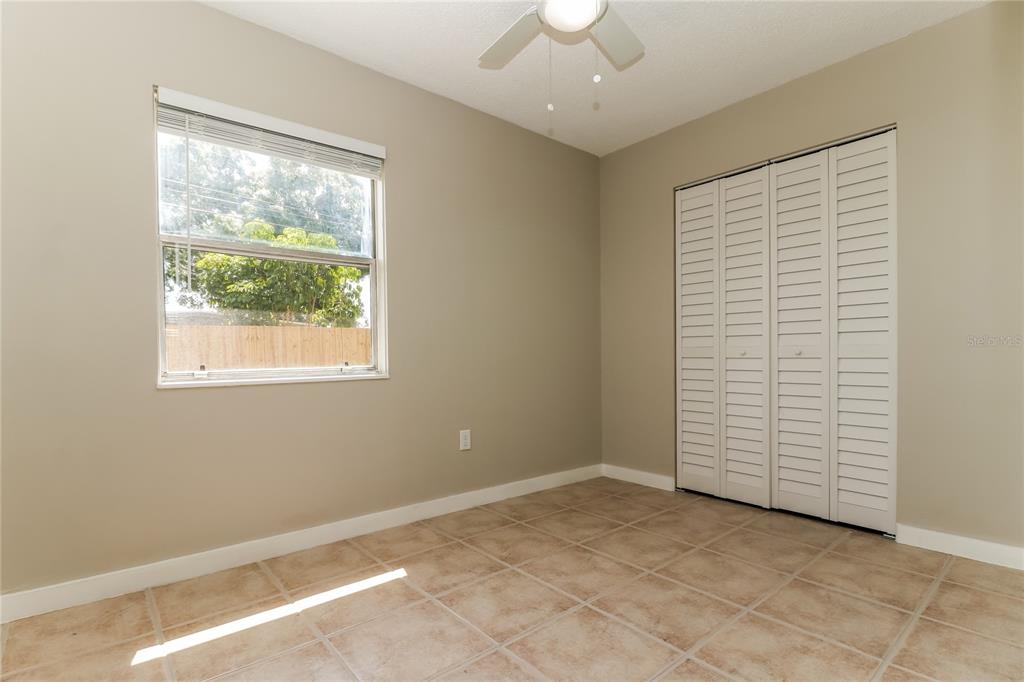 9537 Groveland Street Seminole, FL 33772 - Photo 10 of 16 an empty room with windows