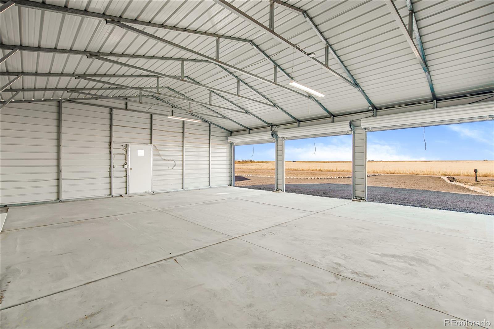 6 Timberlake Road Byers, CO 80103 - Photo 17 of 18 a view of a garage