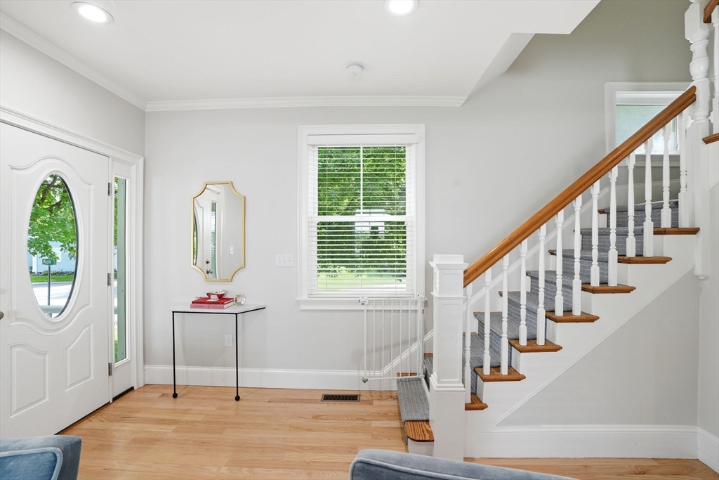 59 Elm Street Hingham, MA 02043 - Photo 3 of 33 a view of entryway and hall with wooden floor