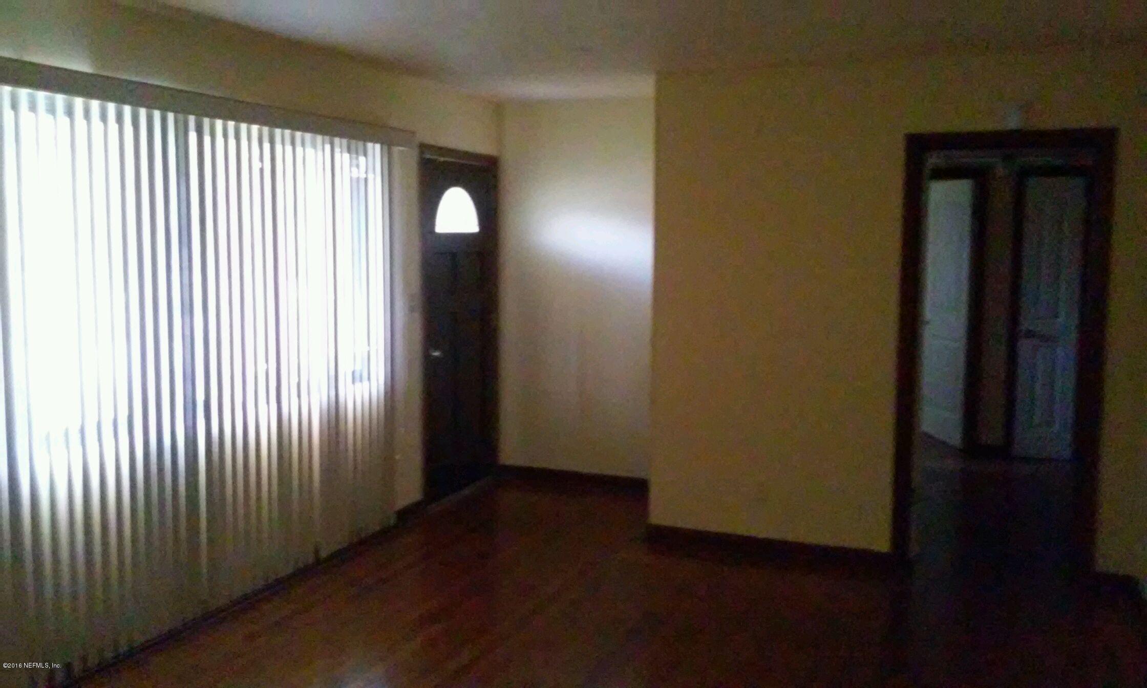 6814 Corday Road Jacksonville, FL 32208 - Photo 6 of 12 corday living room 3