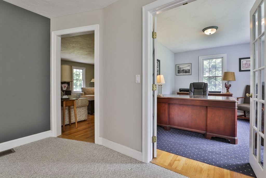 4 Breezy Point Road Acton, MA 01720 - Photo 13 of 40 a view of a bedroom with a workspace and a window