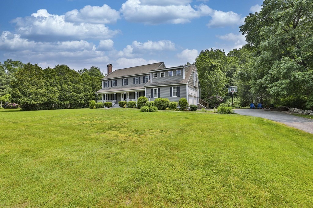4 Breezy Point Road Acton, MA 01720 - Photo 39 of 40 a view of building with yard
