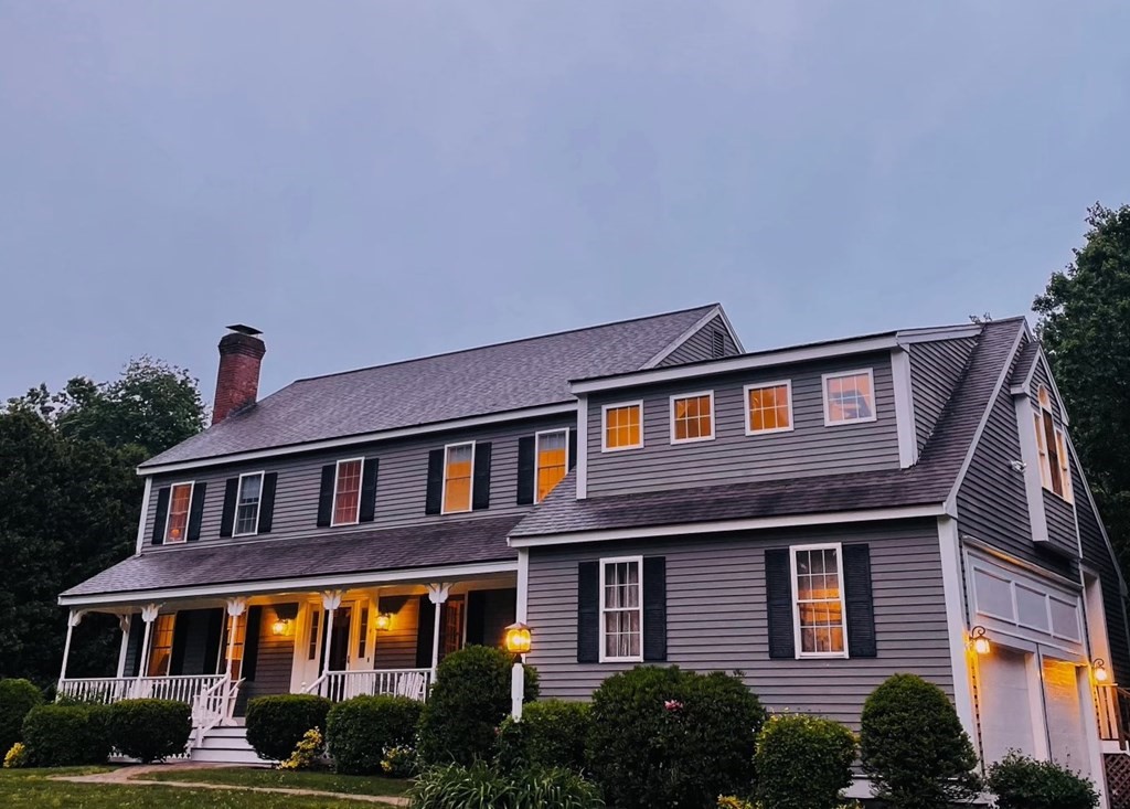 4 Breezy Point Road Acton, MA 01720 - Photo 40 of 40 a front view of residential houses with yard