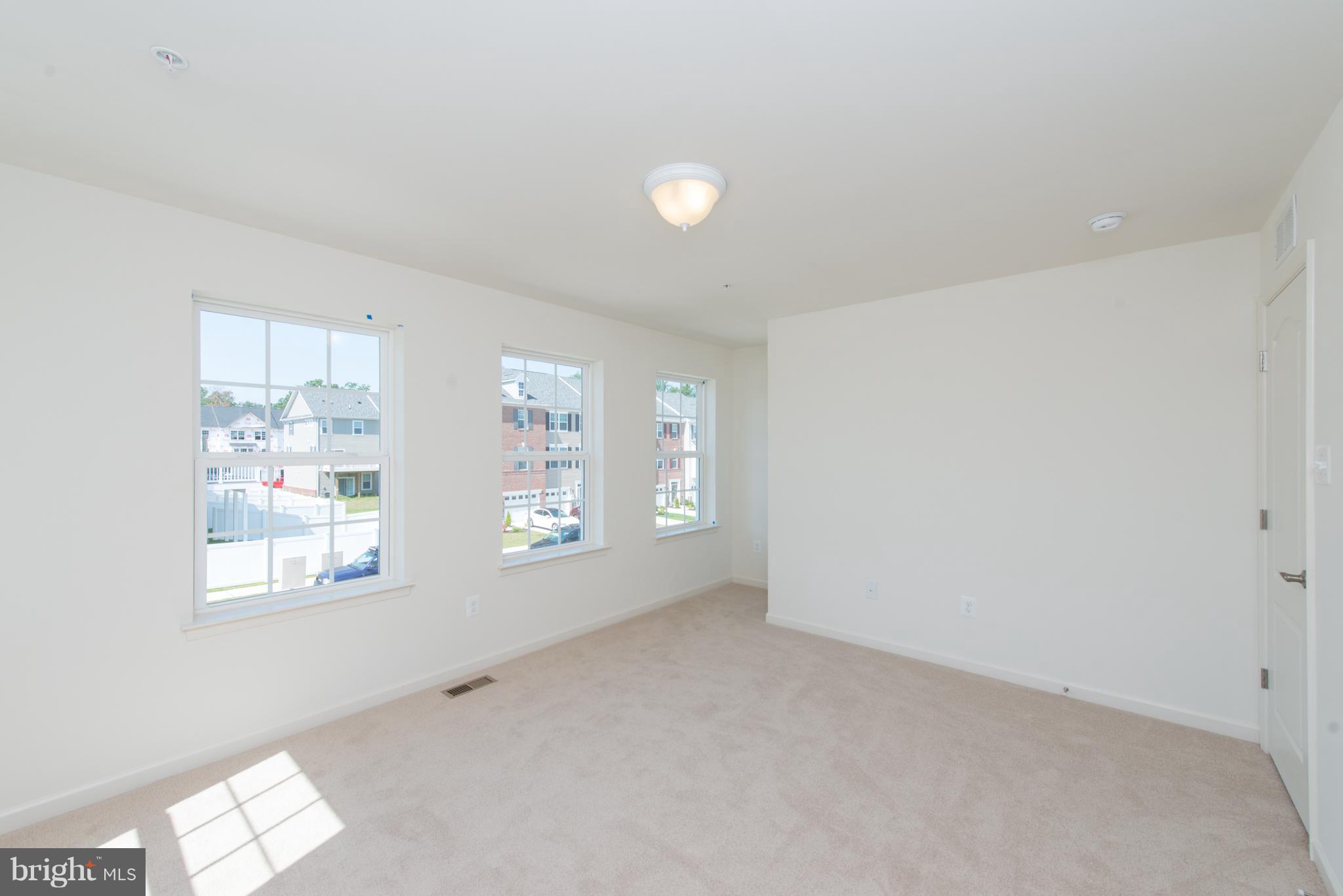 910 Ramble Run Road Baltimore, MD 21220 - Photo 20 of 30 a view of an empty room with a window