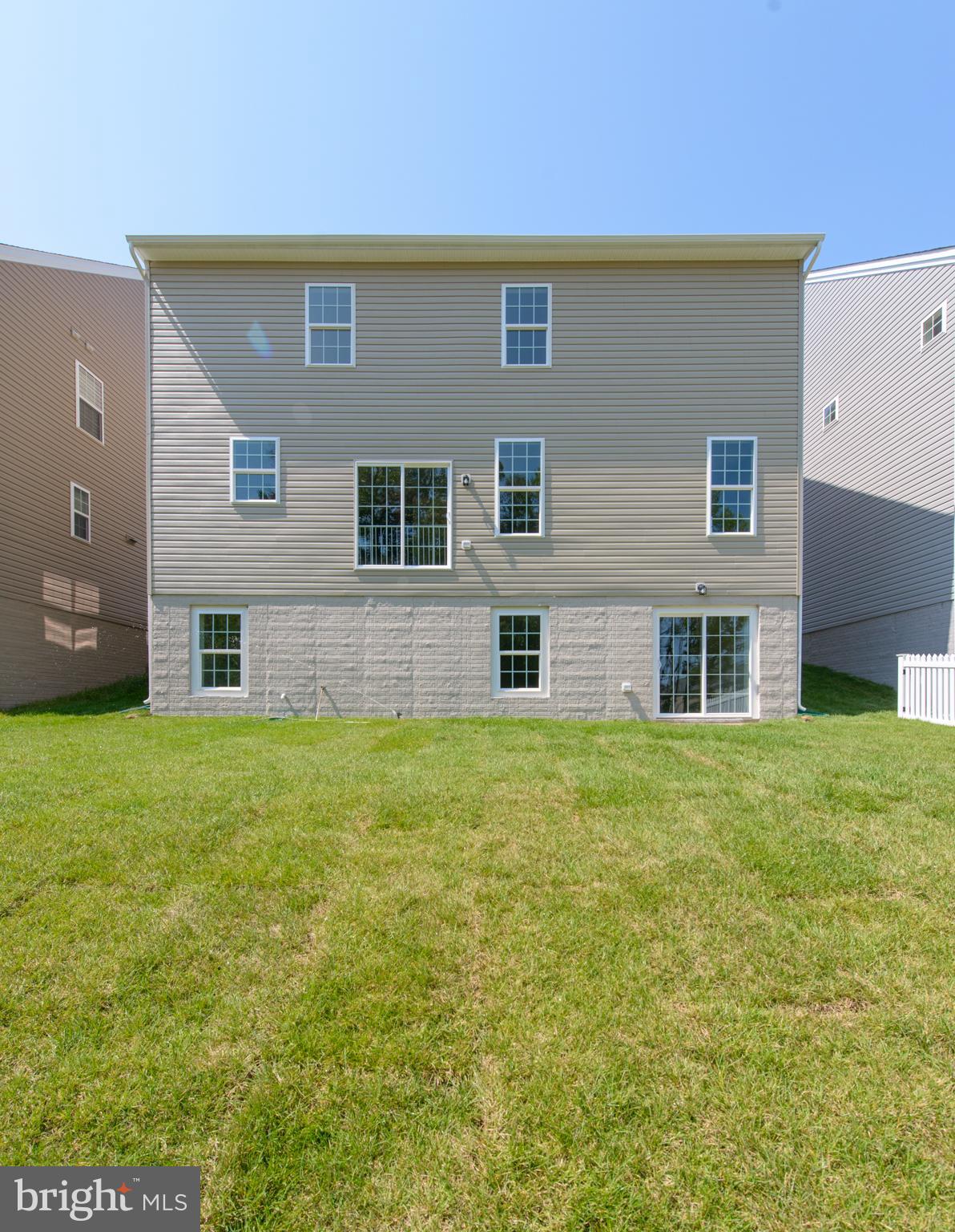 910 Ramble Run Road Baltimore, MD 21220 - Photo 30 of 30 a front view of house with yard
