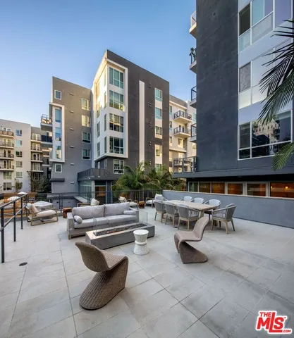 a building outdoor space with patio furniture