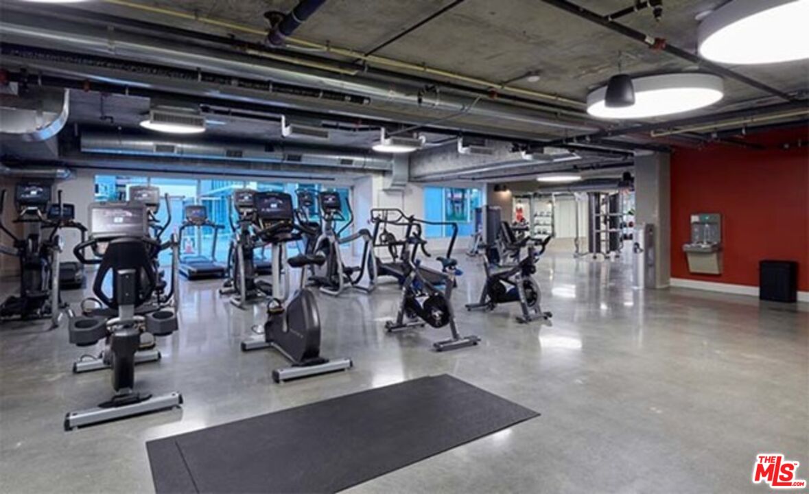 1120 West 6th Street, Unit 2151 Los Angeles, CA 90017 - Photo 45 of 51 a view of a room with gym equipment