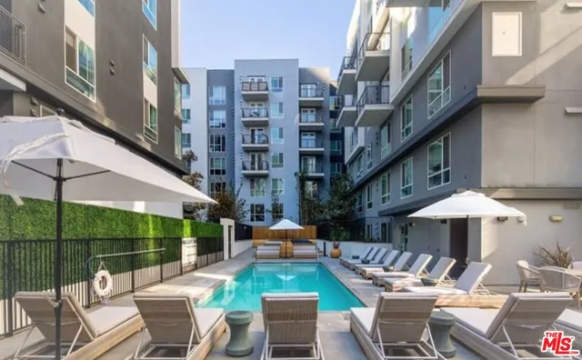 a living room with furniture and window