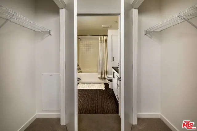 a view of a bathroom from a hallway