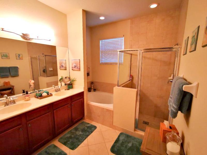 181 Southwest Otter Run Place, Unit 181 Stuart, FL 34997 - Photo 12 of 35 Master Bath