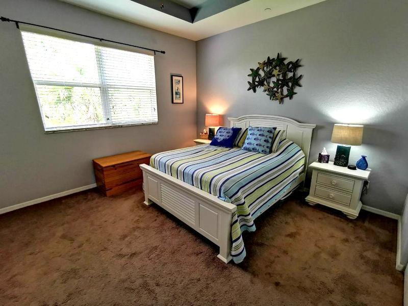 181 Southwest Otter Run Place, Unit 181 Stuart, FL 34997 - Photo 30 of 35 Master bedroom