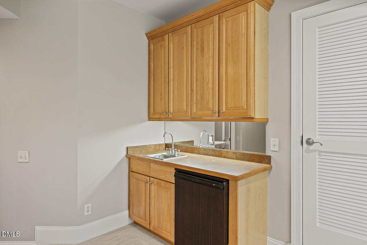 4004 Frontenac Court Apex, NC 27539 - Photo 40 of 61 a utility room with a sink