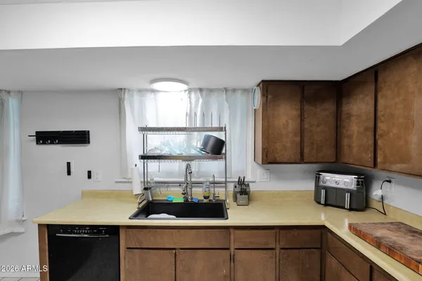 a kitchen with a sink and a cabinets