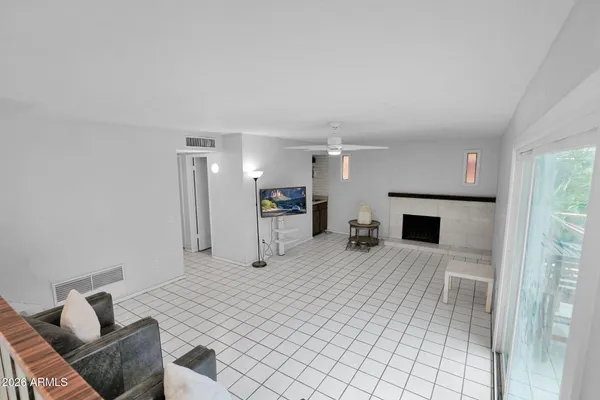 a view of livingroom with furniture and fireplace