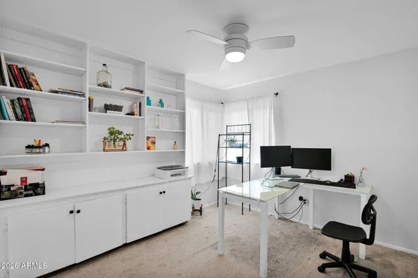 a room with a workspace