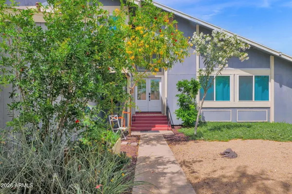 front view of a house with a yard