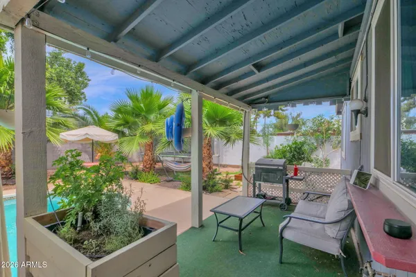 a view of a house with a swimming pool