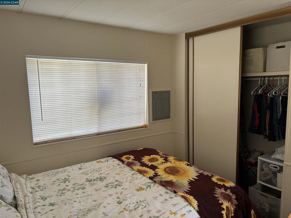 2990 San Pablo Dam Road San Pablo, CA 94803 - Photo 9 of 13 a bedroom with a bed and a window
