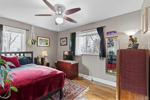 a bed room with a bed and a couch