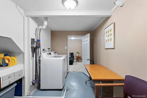 a view of a two chairs in the balcony