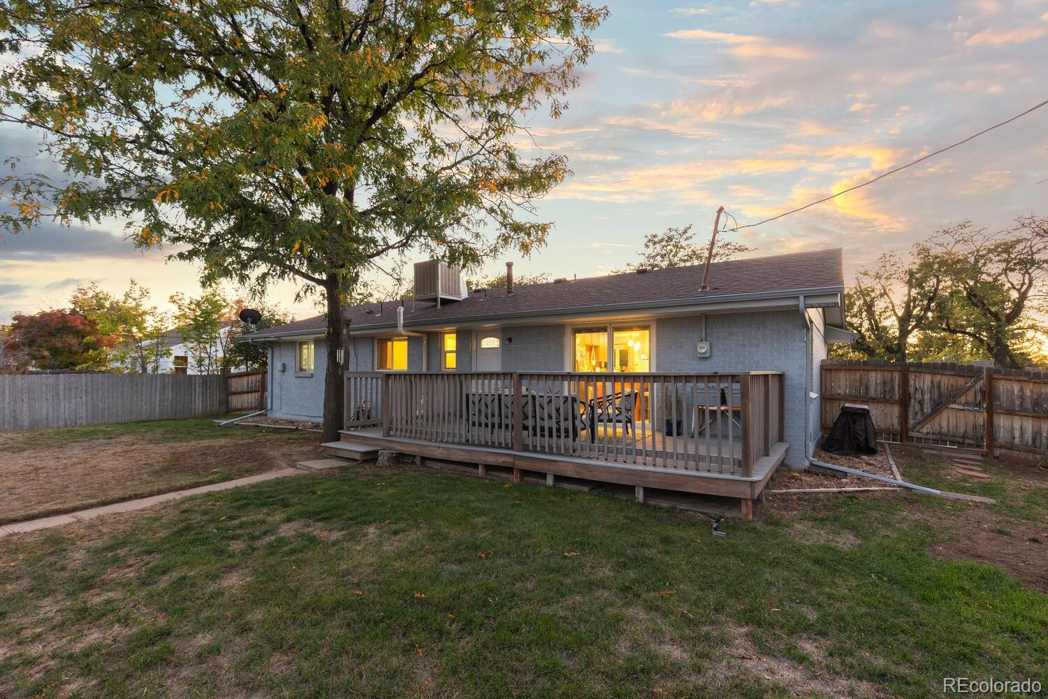236 Lima Street Aurora, CO 80010 - Photo 41 of 50 a view of a house with a yard