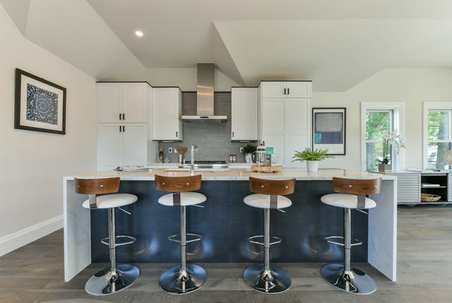 a view of a dining room with gym equipment