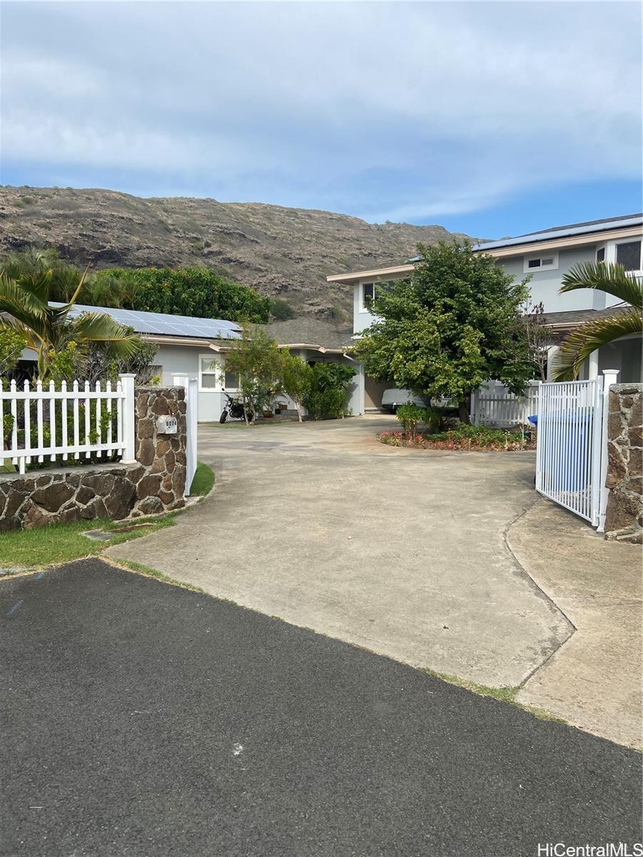 6074 Keoki Place Honolulu, HI 96821 - Photo 1 of 1 a view of a terrace with a garden