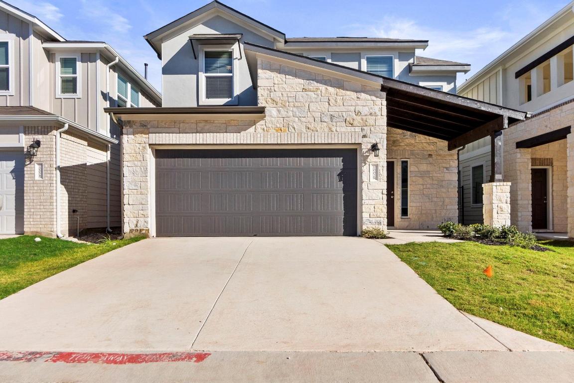 10029 Dawn Pearl Drive Austin, TX 78748 - Photo 1 of 1 a front view of a house with a yard