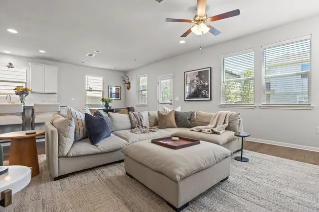 a living room with furniture and a window