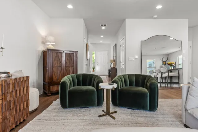 a living room with furniture and a couch