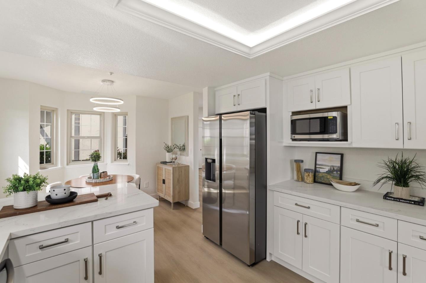 120 Haslemere Court Lafayette, CA 94549 - Photo 12 of 49 a kitchen with white cabinets and stainless steel appliances